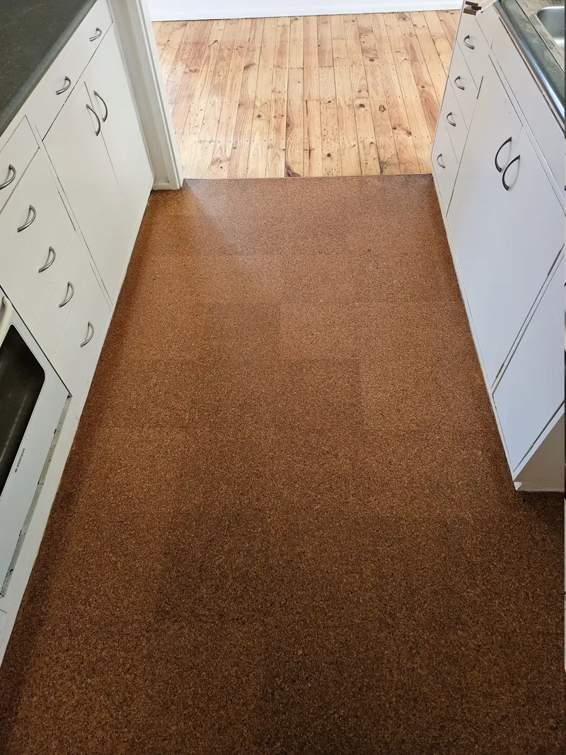 After: the cork tiles restored to an even finish