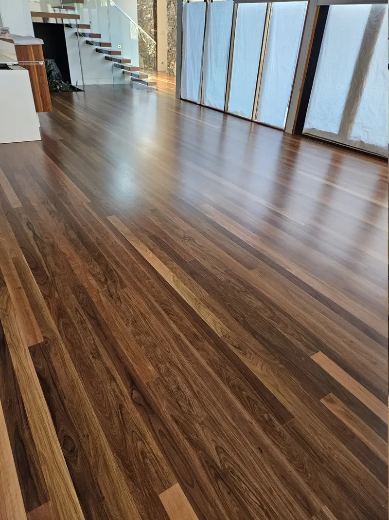 After: the floor repaired and refinished with a seamless finish